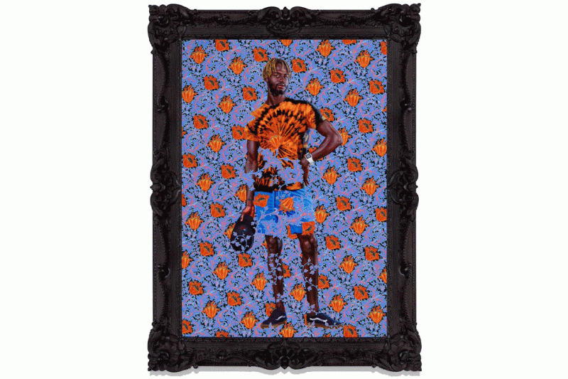 Portrait of a young Black man with orange poppies in the background.